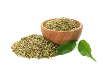 Wooden bowl with aromatic mate tea on white background
