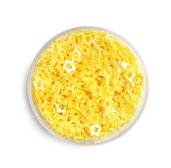 Yellow sequins in shape of stars on white background, top view