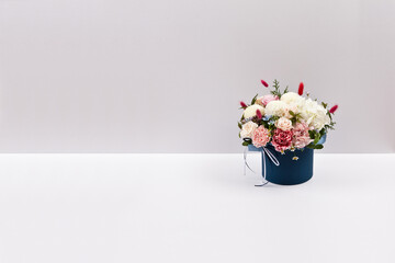 You can easily isolate the background by shooting a flower basket on a white background.