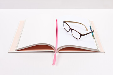 The book is isolated on a white background. A free background is possible.