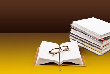 The book is separated from the background, allowing for a free background.