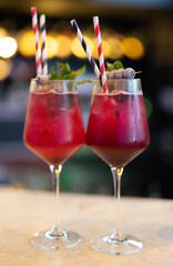 beautiful and delicious alcoholic cocktails prepared at the bar by the bartender.