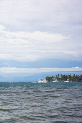 Beautiful Isla Grande beach in Colon, Panama, sky and blue sea