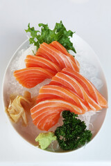Close up slice of salmon sashimi, Japanese food