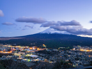 Twilight high angle view of the Mt. Fuji with cityscape