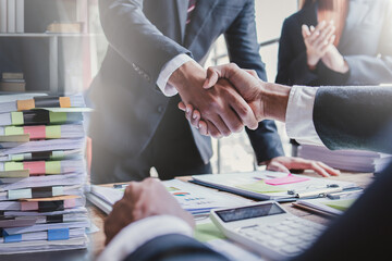 Business handshake for teamwork of business merger and acquisition,successful negotiate,hand...