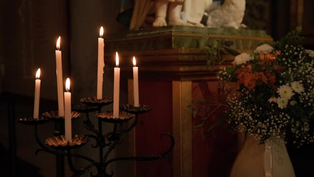 A Vintage Candle Holder Illuminated Inside The Historical Building. Close Up