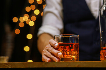 Bartender Serve Whiskey, on wood bar, 