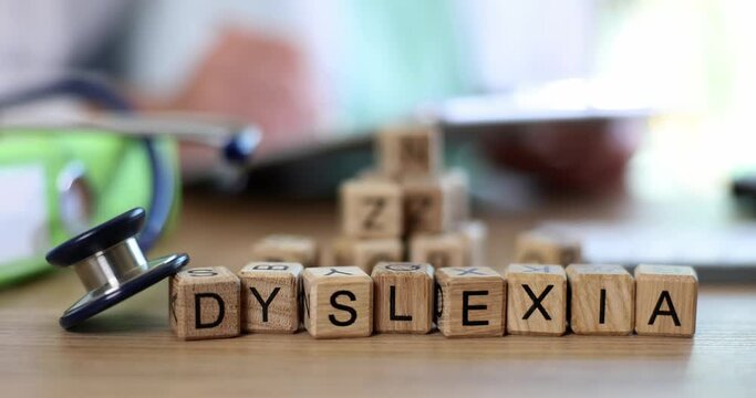 Medical stethoscope text on dyslexia cubes