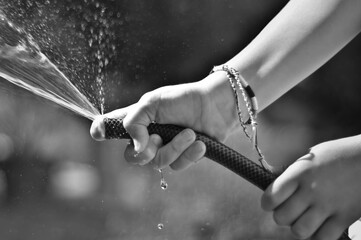 person holding a glass of water
