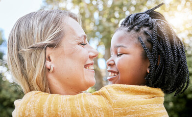 Hug, smile and mother love with girl in a nature park with love, foster care and diversity. Happy,...