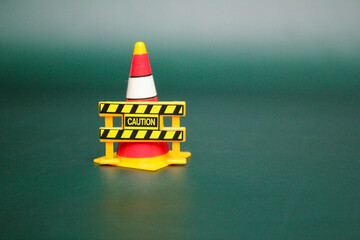 construction cone with caution word fence. Yellow Caution In The Construction Of Traffic Signs With...