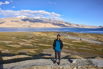 Fototapeta premium Tourist in Tso Moriri Lake, Korzok village, Ladakh, India. 