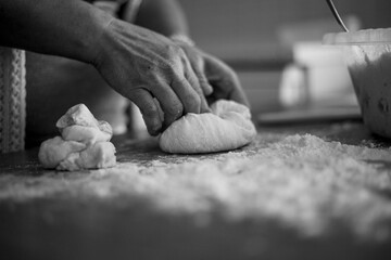 Housewife makes the bread at the home.