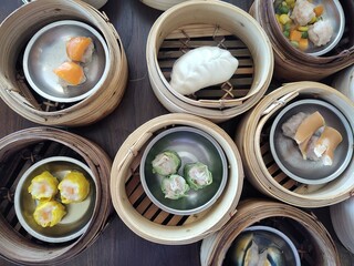 hot mixed dim sum on table for morning meal