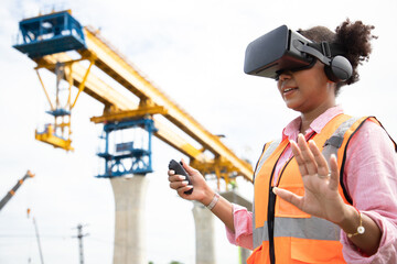 Futuristic architectural engineer woman wearing augmented reality headset and using gestures to...