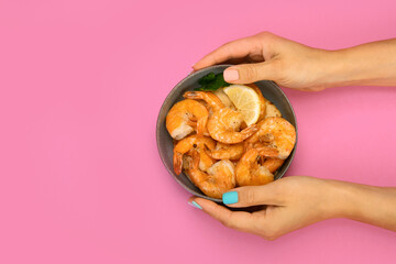 Shrimps on color background.