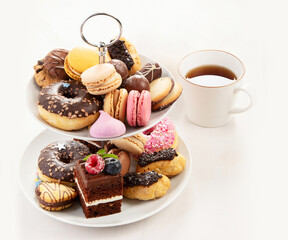 Afternoon tea stand with sweet treats.