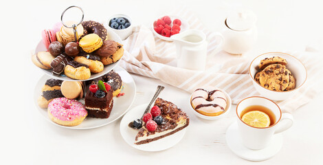 Obraz na płótnie Canvas Afternoon tea stand with sweet treats.