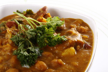 Mechado, a Filipino stew made of pork or beef with tomato sauce, potatoes and bell peppers
