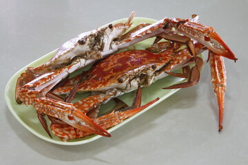 Two crabs on a platter