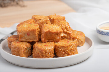 Deep Fried Chicken Roll in a white plate