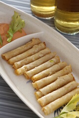 Cheese sticks pick up food with beer