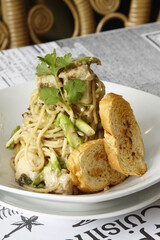 Chicken pasta dish with vertical plating