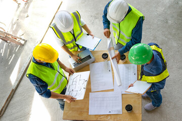 engineering teamwork meeting on site work,engineers project manager consultation meeting with...