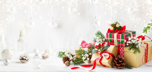 Christmas or New Year still life with Gift Boxes and Christmas Decorationson a white wooden table....