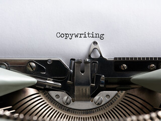 The word copywriting written with a vintage typewriter. Marketing and advertising concept copywriter.
