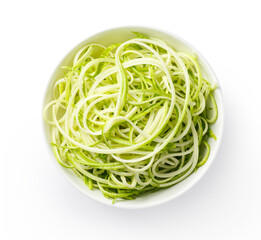 Raw zucchini noodles isolated. Zucchini spaghetti in white bowl. Top view.