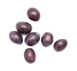 Ripe plum berries isolated on white background.