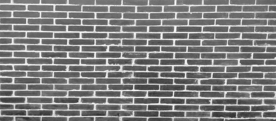 Fototapeta na wymiar The Black Color of Brick Wall Surface as Background