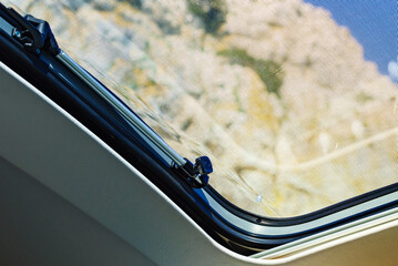 Sunroof, raisable window on roof top of camper