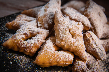 TRADITIONAL WONDERS OF SOUTH-WESTERN FRANCE, SPRINKLED WITH ICING SUGAR AND FLAVOURED WITH RUM AND ORANGE FLOWER WATER, High quality photo