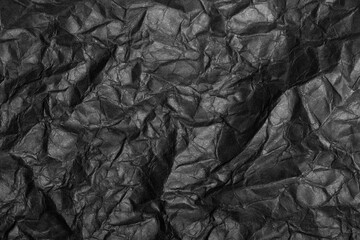 black paper texture background crumpled pattern 
