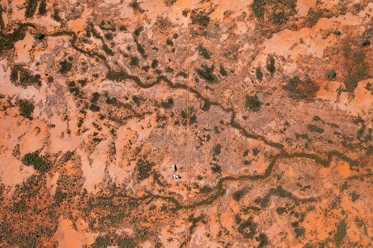 Aerial drone shot of erosion in red desert landscape aerial 