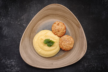 Steamed meat cutlets with boiled mashed potatoes