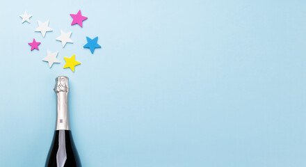 Champagne bottle and star decor