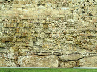 Castle wall made from old stones textures for design and photo