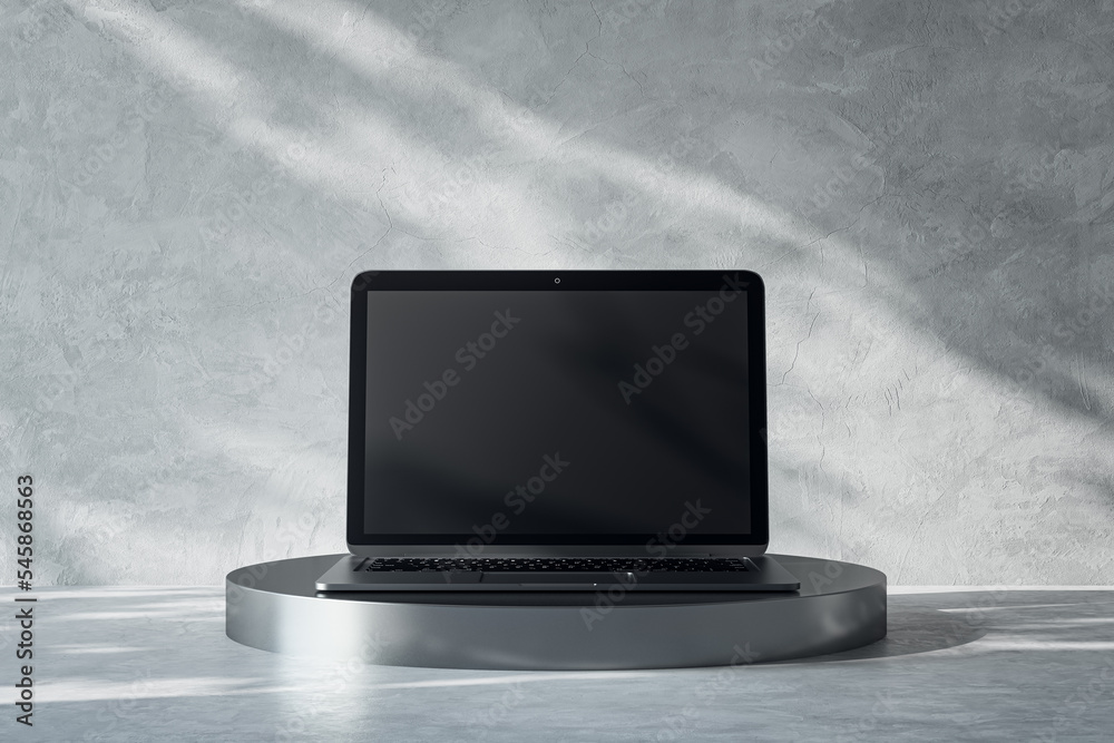 Poster front view on blank black modern laptop monitor with place for your logo or text on dark metallic ro
