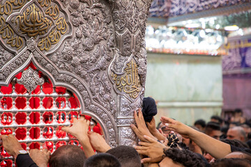 The shrine of Imam Hussein, Commander of the Faithful, Ali Ibn Abi Talib, peace be upon them, in...