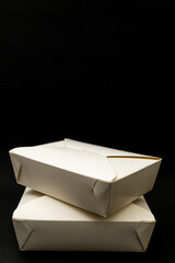 White cardboard takeout boxes, an urban living concept, home delivery