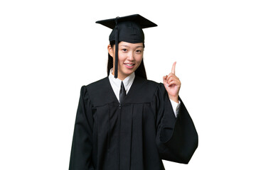 Young university graduate Asian woman over isolated background showing and lifting a finger in sign of the best