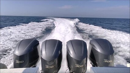 Jakarta Indonesia - June 23, 2022: powerful outboard engines on boats in the waters of the thousand islands Jakarta, Indonesia