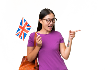 Young Asian woman holding an United Kingdom flag over isolated background pointing finger to the side and presenting a product