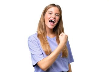 Young beautiful woman over isolated background celebrating a victory