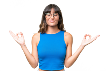 Young caucasian woman over isolated background in zen pose