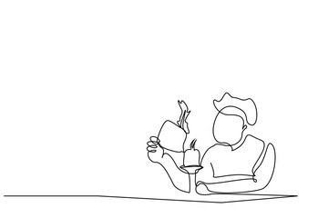 person burns paper in his hand with a candle fire flames come out